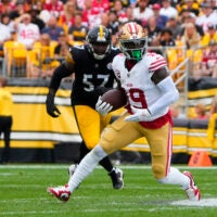 Sep 10, 2023; Pittsburgh, Pennsylvania, USA; San Francisco 49ers wide receiver Deebo Samuel (19) runs with the ball after making a catch against the Pittsburgh Steelers during the first half at Acrisure Stadium