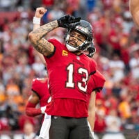 Dec 24, 2023; Tampa, Florida, USA; Tampa Bay Buccaneers wide receiver Mike Evans (13) celebrates the touchdown against the Jacksonville Jaguars in the second quarter at Raymond James Stadium.