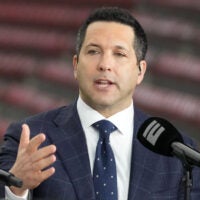 Jan 8, 2024; Houston, TX, USA; Adam Schefter talks on a set before the 2024 College Football Playoff national championship game between the Michigan Wolverines and the Washington Huskies at NRG Stadium.
