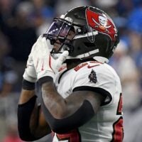 Sep 15, 2024; Detroit, Michigan, USA; Tampa Bay Buccaneers safety Christian Izien (29) celebrates against the Detroit Lions in the fourth quarter at Ford Field.