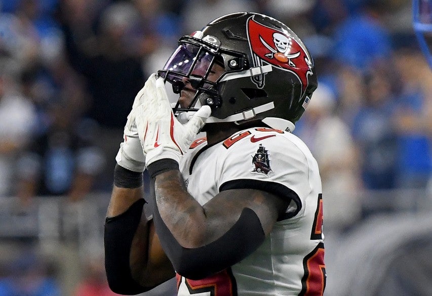Sep 15, 2024; Detroit, Michigan, USA; Tampa Bay Buccaneers safety Christian Izien (29) celebrates against the Detroit Lions in the fourth quarter at Ford Field.