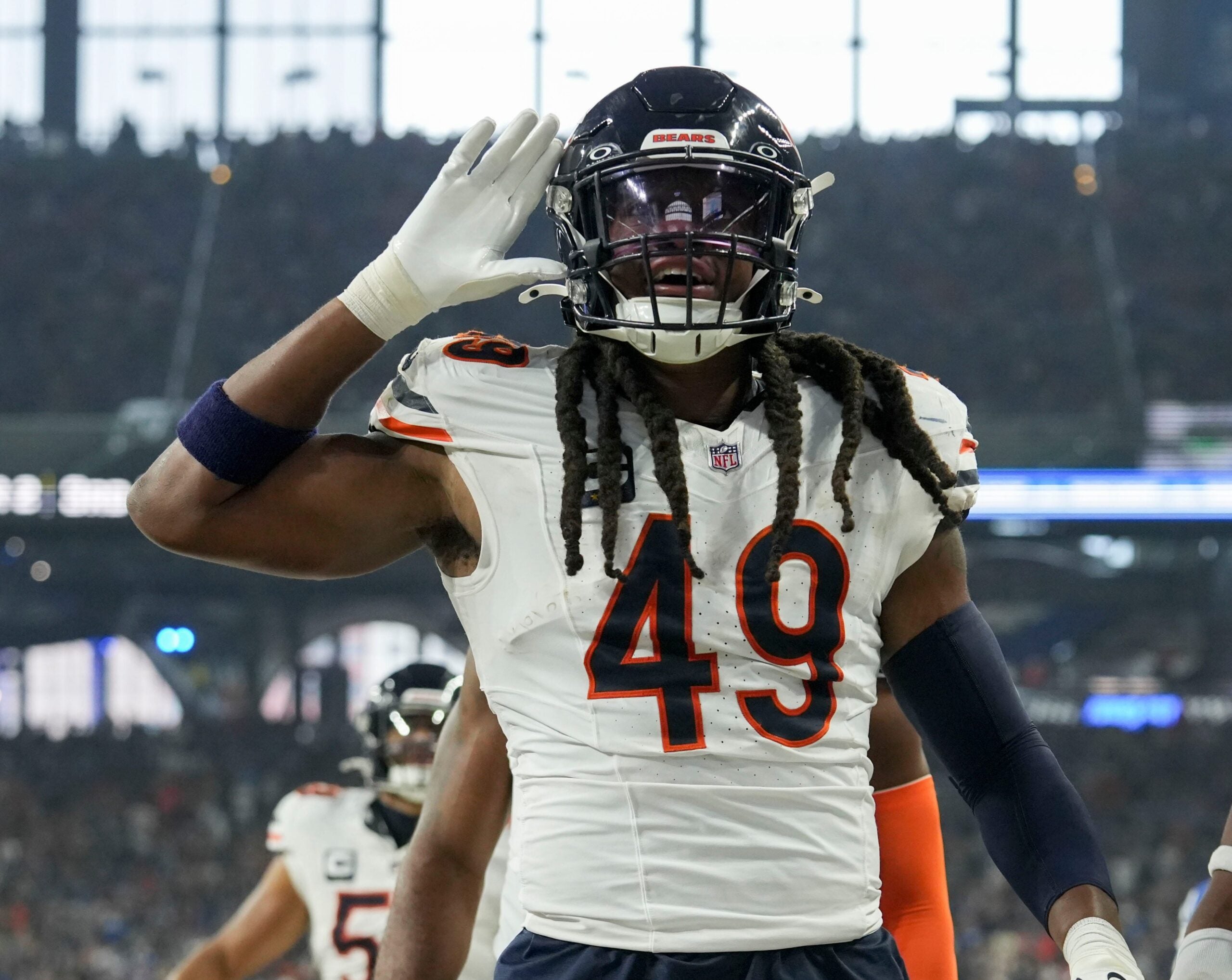 Chicago Bears linebacker Tremaine Edmunds (49) celebrates after making an interception during a game against the Indianapolis Colts at Lucas Oil Stadium in Indianapolis.