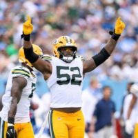 Sep 22, 2024; Nashville, Tennessee, USA; Green Bay Packers defensive end Rashan Gary (52) celebrates the sack against the Tennessee Titans during the second half at Nissan Stadium.