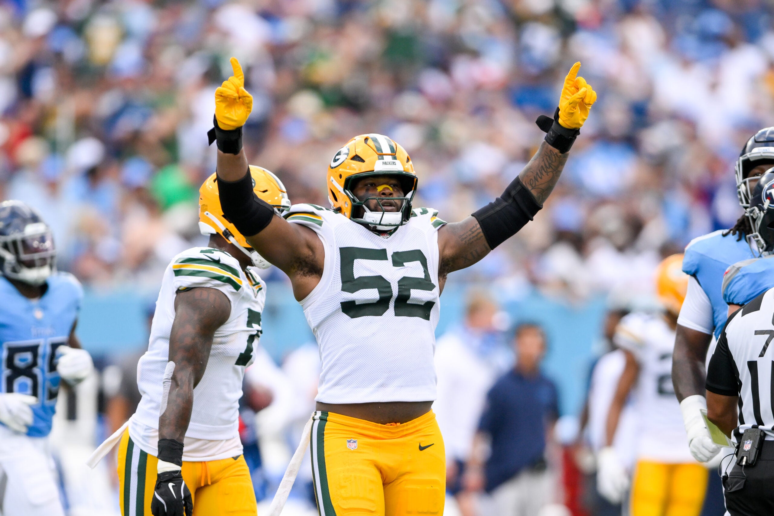 Sep 22, 2024; Nashville, Tennessee, USA; Green Bay Packers defensive end Rashan Gary (52) celebrates the sack against the Tennessee Titans during the second half at Nissan Stadium.