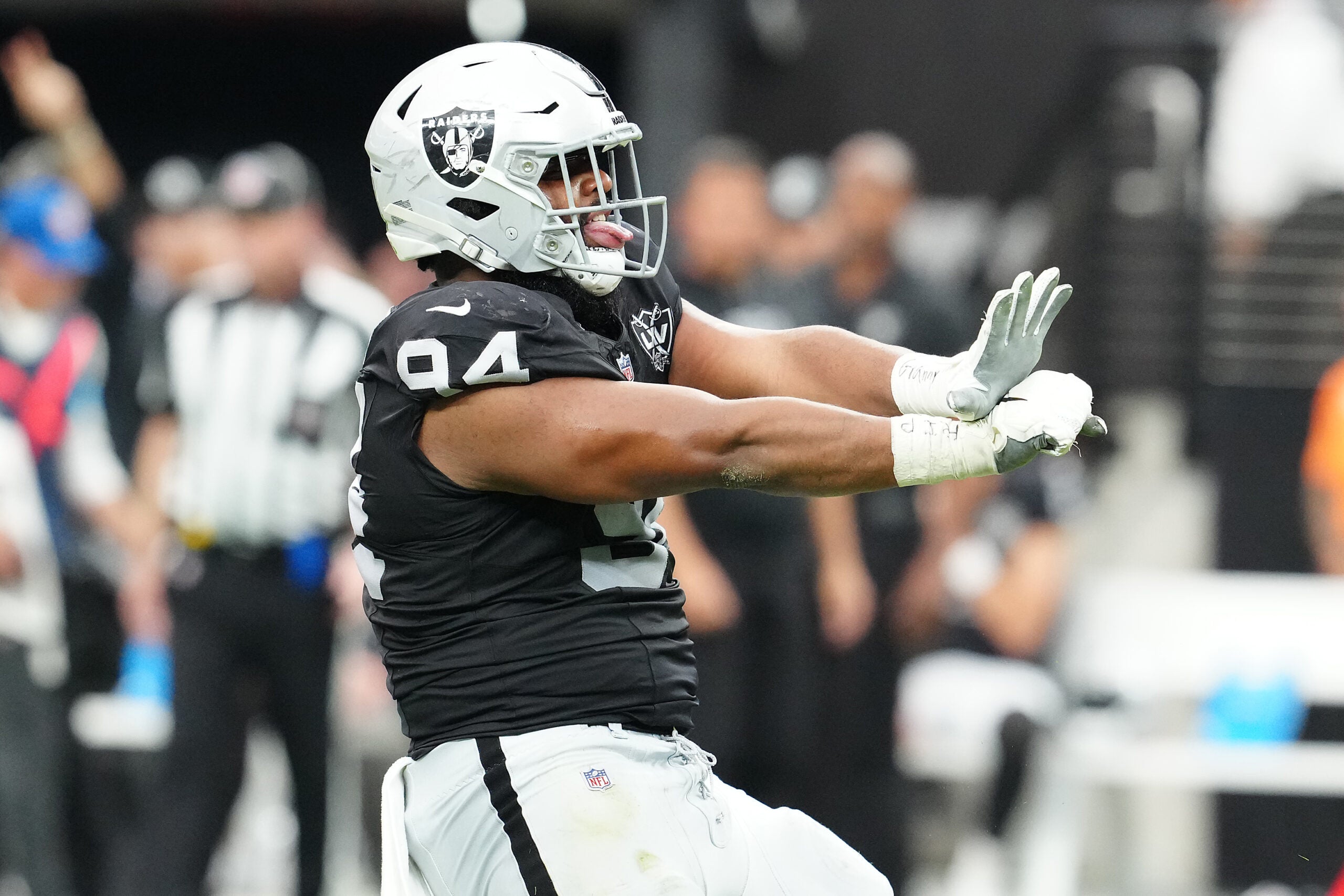 Sep 22, 2024; Paradise, Nevada, USA; Las Vegas Raiders defensive tackle Christian Wilkins (94) celebrates after getting a sack against the Carolina Panthers during the second quarter at Allegiant Stadium.