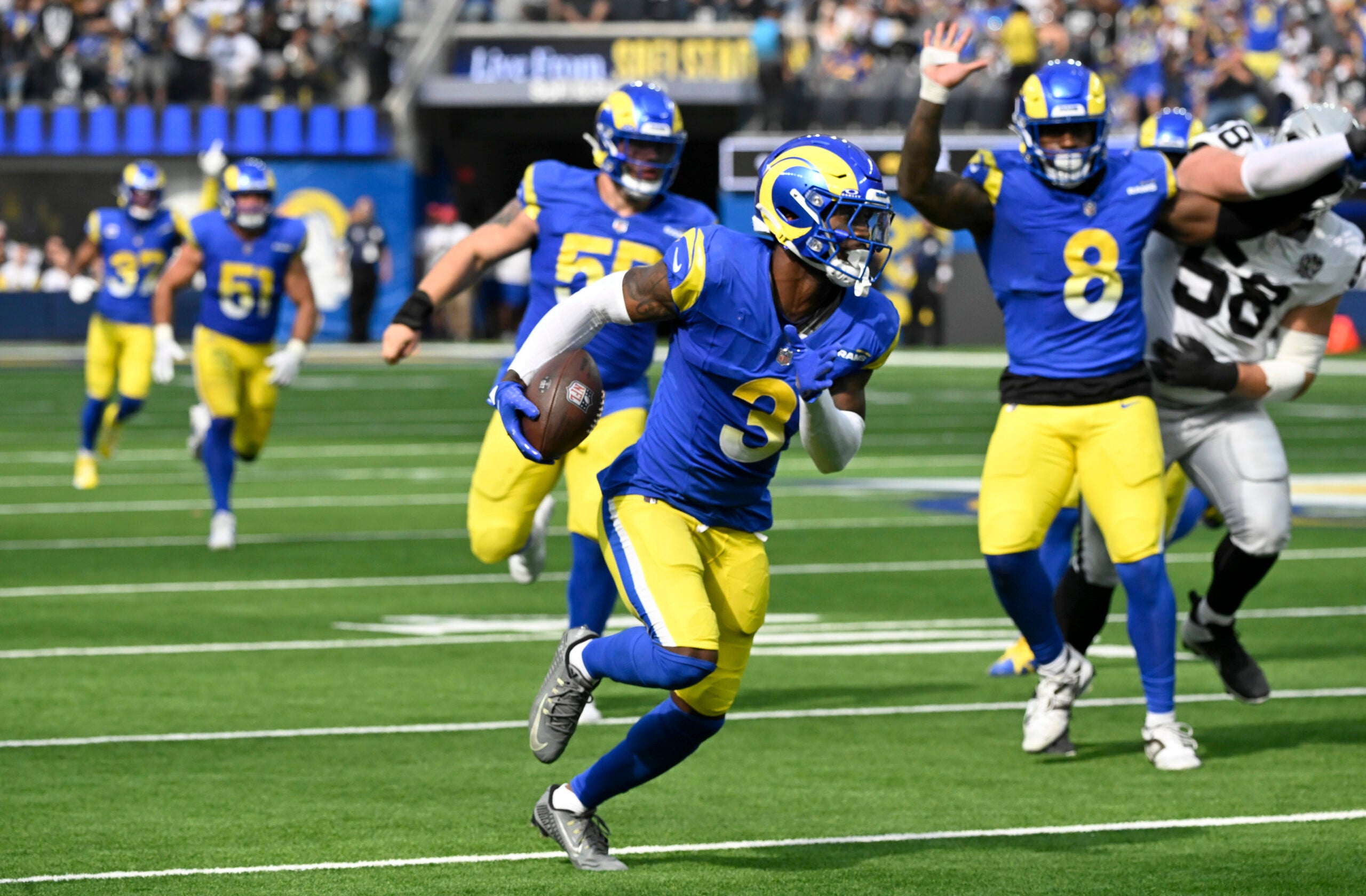 Oct 20, 2024; Inglewood, California, USA; Los Angeles Rams safety Kamren Curl (3) picks up a fumble by Las Vegas Raiders quarterback Gardner Minshew (not pictured) in the second quarter at SoFi Stadium.Curl ran the ball back for a touchdown.