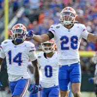 Nov 2, 2024; Jacksonville, Florida, USA; Florida Gators defensive back Devin Moore (28) celebrates after an interception against the Georgia Bulldogs during the first half at EverBank Stadium.