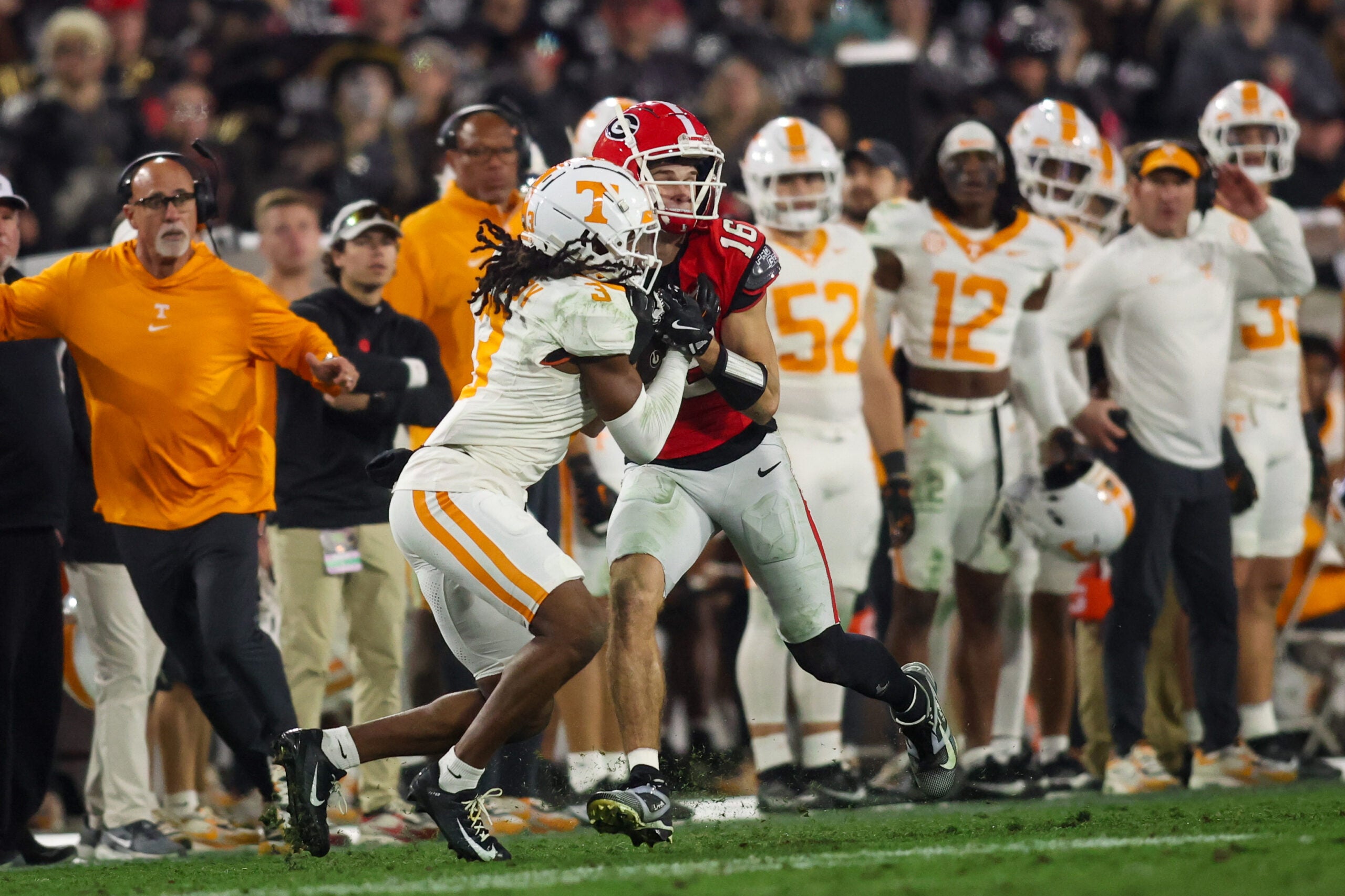 Nov 16, 2024; Athens, Georgia, USA; Georgia Bulldogs wide receiver London Humphreys (16) catches a pass in front of Tennessee Volunteers defensive back Jermod McCoy (3) in the fourth quarter at Sanford Stadium.