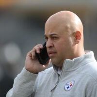 Nov 17, 2024; Pittsburgh, Pennsylvania, USA; Pittsburgh Steelers general manager Omar Khan talks on the phone before the game against the Baltimore Ravens at Acrisure Stadium.