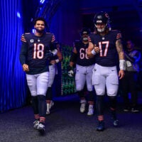 Nov 17, 2024; Chicago, Illinois, USA; Chicago Bears quarterback Caleb Williams (18) and quarterback Tyson Bagent (17) enter the field before the game against the Green Bay Packers at Soldier Field.