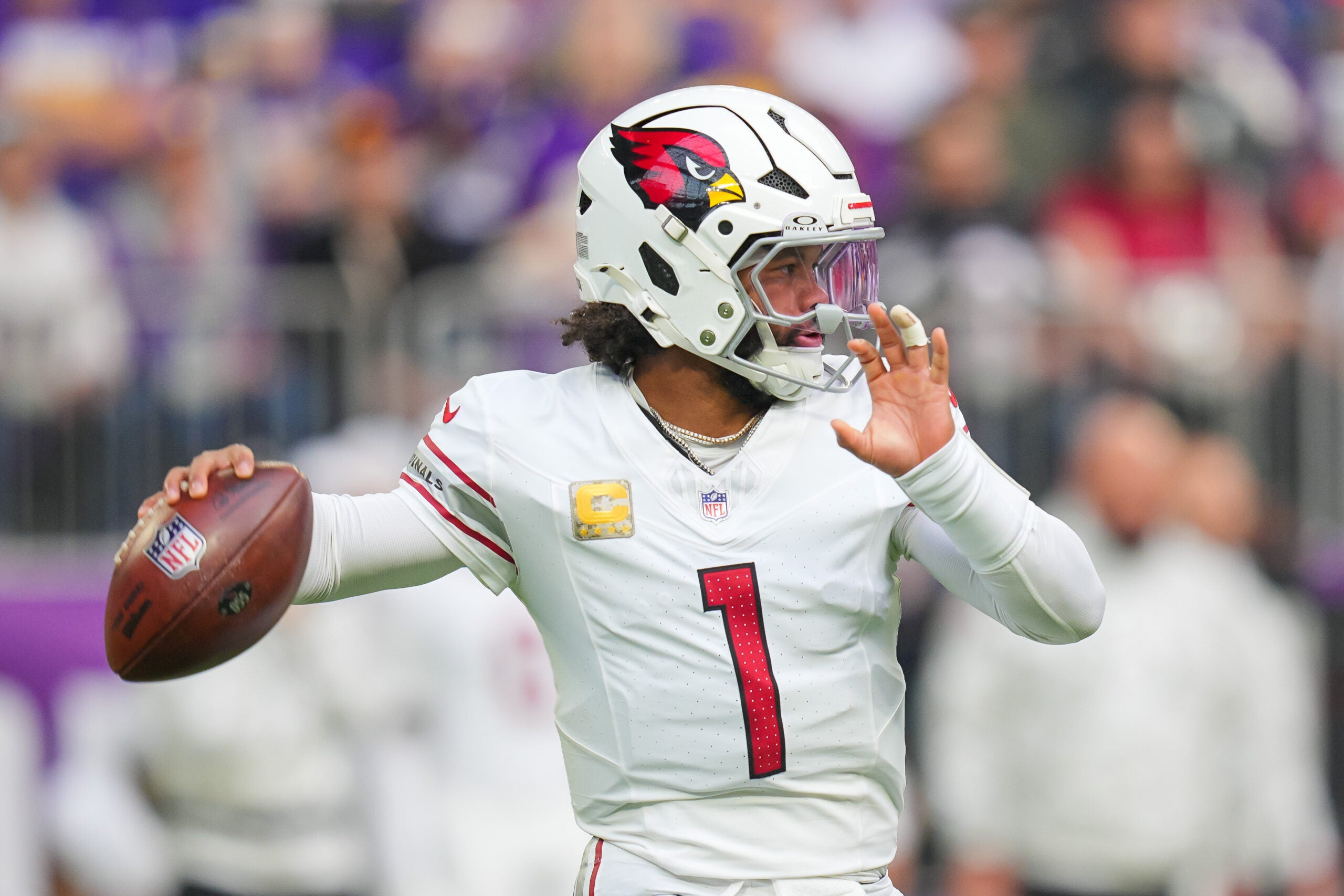 Dec 1, 2024; Minneapolis, Minnesota, USA; Arizona Cardinals quarterback Kyler Murray (1) passes against the Minnesota Vikings in the first quarter at U.S. Bank Stadium.