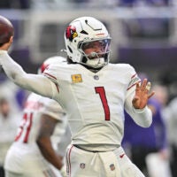 Dec 1, 2024; Minneapolis, Minnesota, USA; Arizona Cardinals quarterback Kyler Murray (1) throws a pass against the Minnesota Vikings during the second quarter at U.S. Bank Stadium.