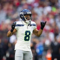 Dec 8, 2024; Glendale, Arizona, USA; Seattle Seahawks cornerback Coby Bryant (8) against the Arizona Cardinals at State Farm Stadium.