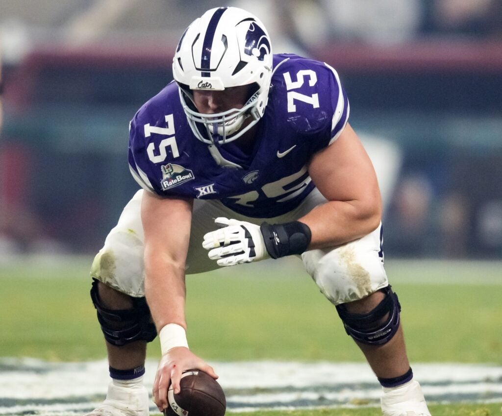 Dec 26, 2024; Phoenix, AZ, USA; Kansas State Wildcats offensive lineman Sam Hecht (75) against the Rutgers Scarlet Knights during the Rate Bowl at Chase Field.