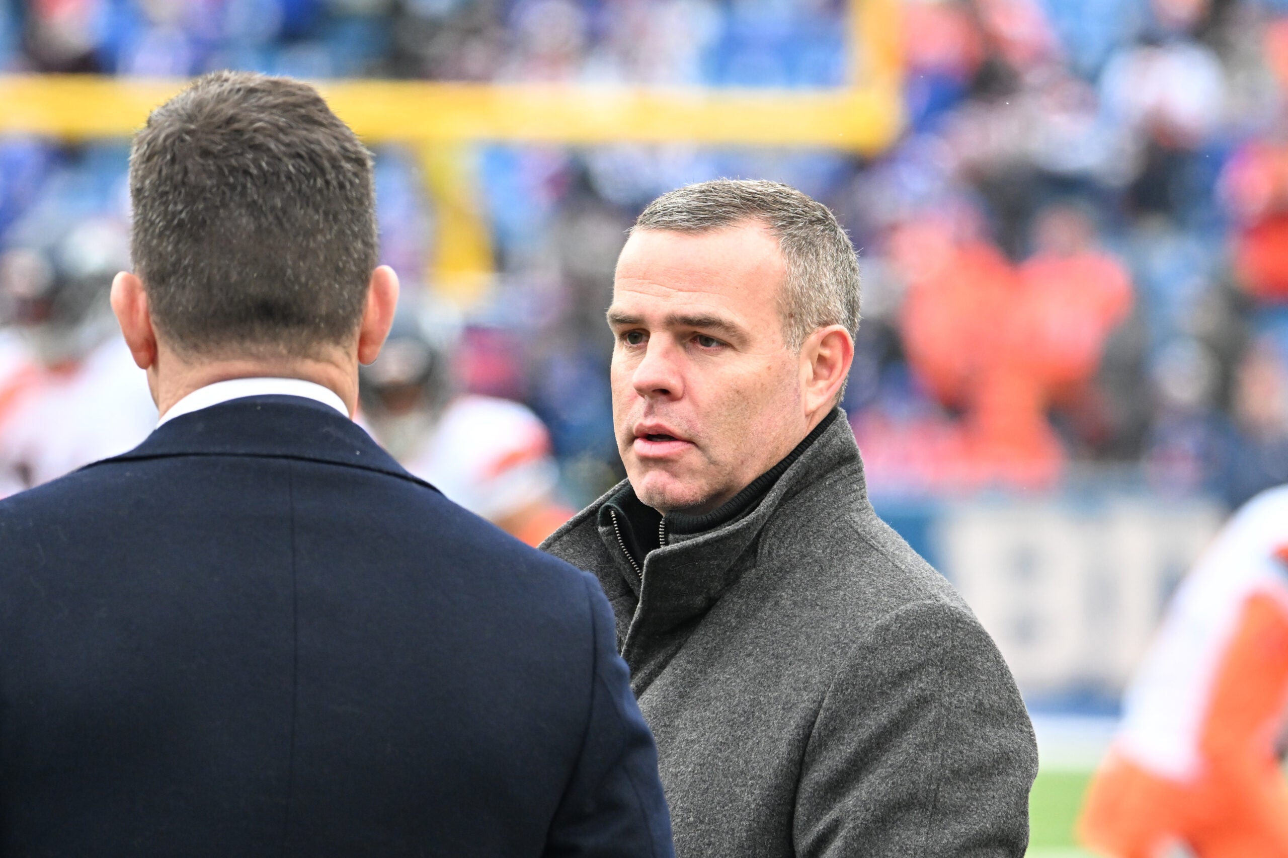 Jan 12, 2025; Orchard Park, New York, USA: Buffalo Bills general manager Brandon Beane watches warmups prior to a game against the Denver Broncos in an AFC wild card game at Highmark Stadium.