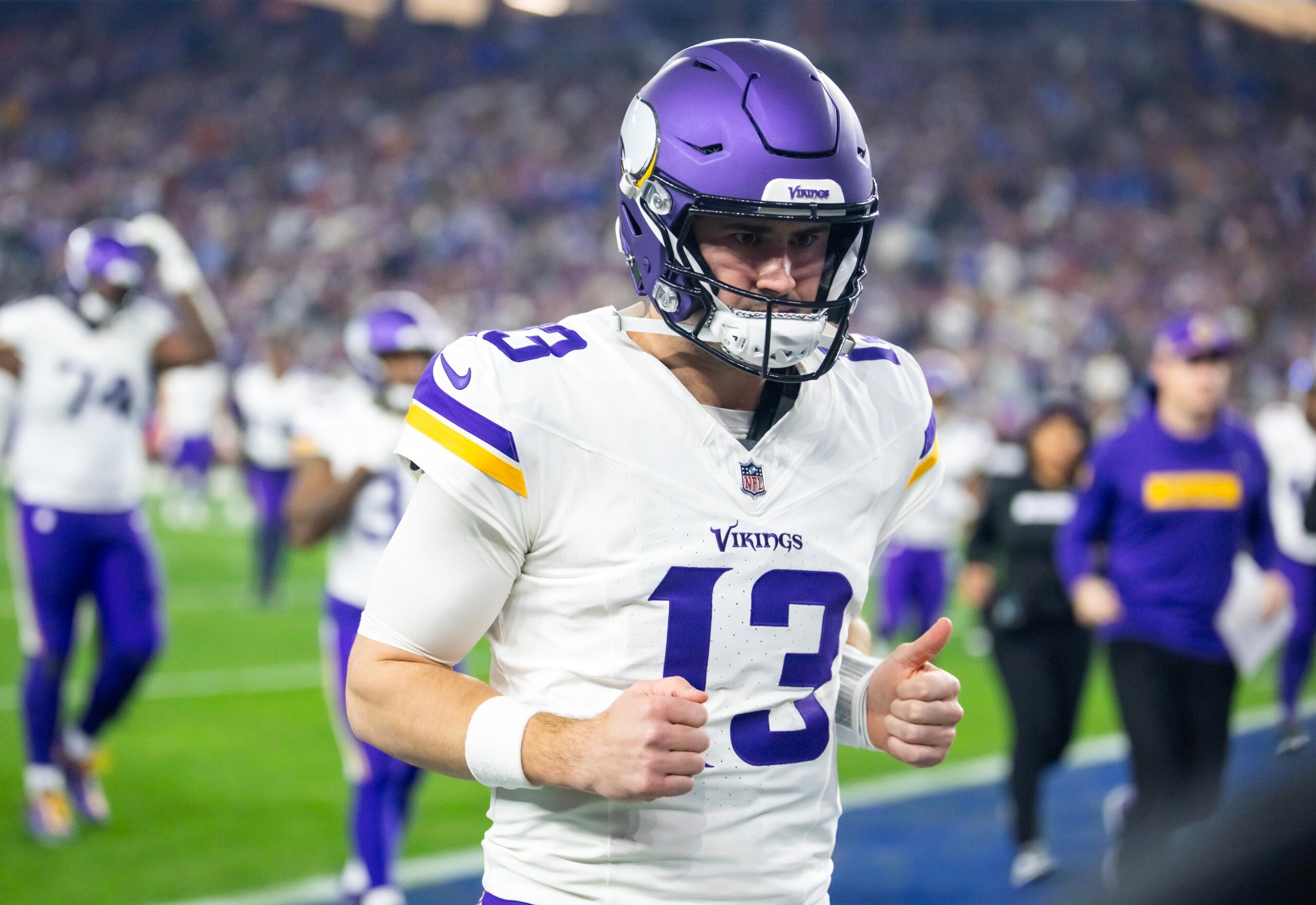 Jan 13, 2025; Glendale, AZ, USA; Minnesota Vikings quarterback Daniel Jones (13) against the Los Angeles Rams during an NFC wild card game at State Farm Stadium.