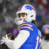 Buffalo Bills quarterback Josh Allen throws a pass, warming up before the Buffalo Bills divisional game against the Baltimore Ravens at Highmark Stadium in Orchard Park on Jan. 19, 2025.