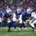 Jan 19, 2025; Orchard Park, New York, USA; Buffalo Bills quarterback Josh Allen (17) with center Connor McGovern (66) and guard O'Cyrus Torrence (64) against the Baltimore Ravens in the first quarter of a 2025 AFC divisional round game at Highmark Stadium.