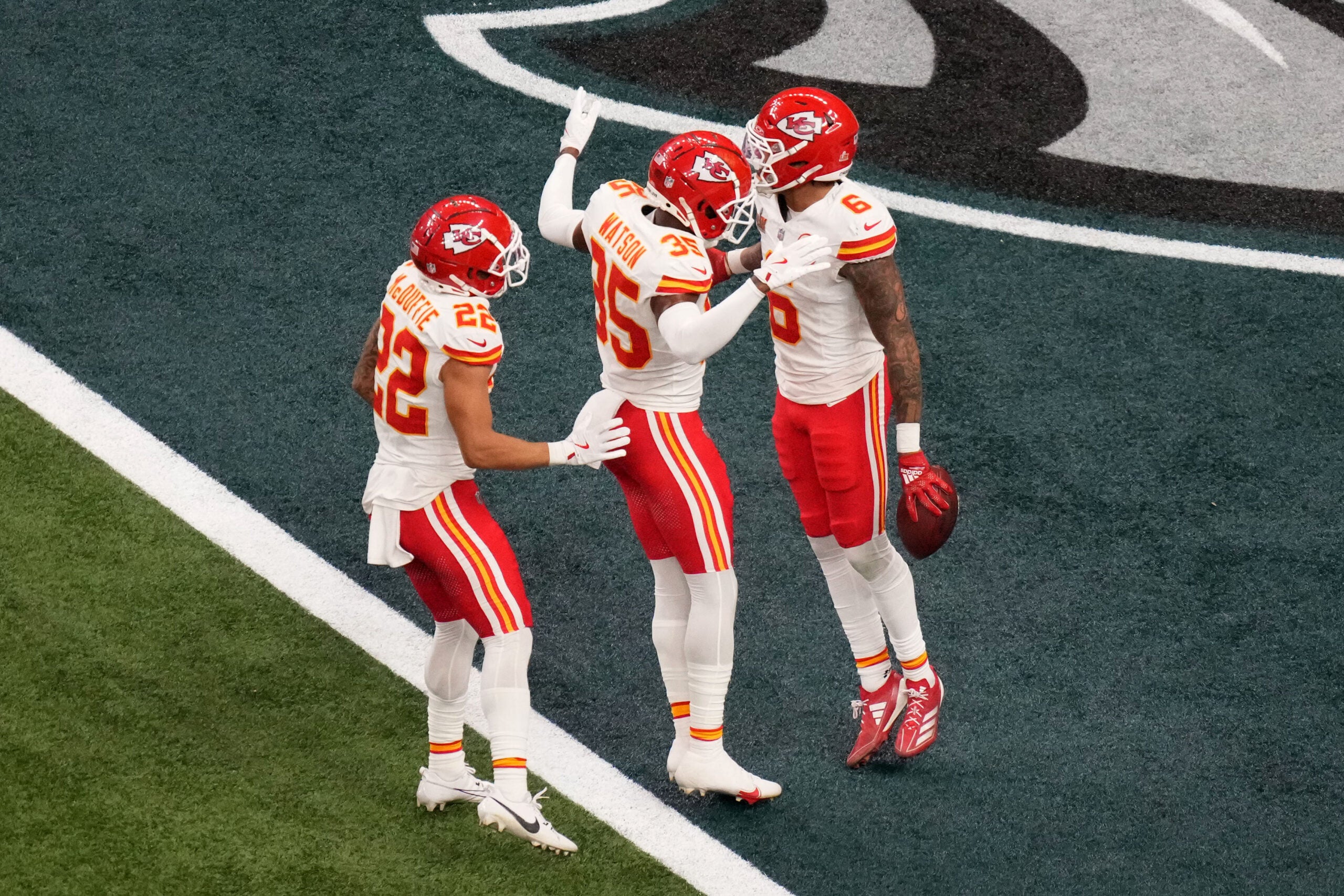 Feb 9, 2025; New Orleans, LA, USA; Kansas City Chiefs safety Bryan Cook (6) reacts with cornerback Jaylen Watson (35) and cornerback Trent McDuffie (22) after an interception during the second quarter in Super Bowl LIX against the Philadelphia Eagles at Caesars Superdome.