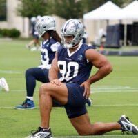 Jun 10, 2025; Arlington, TX, USA; Dallas Cowboys defensive tackle Solomon Thomas (90) goes through a drill during practice at the Ford Center at the Star Training Facility in Frisco, Texas.