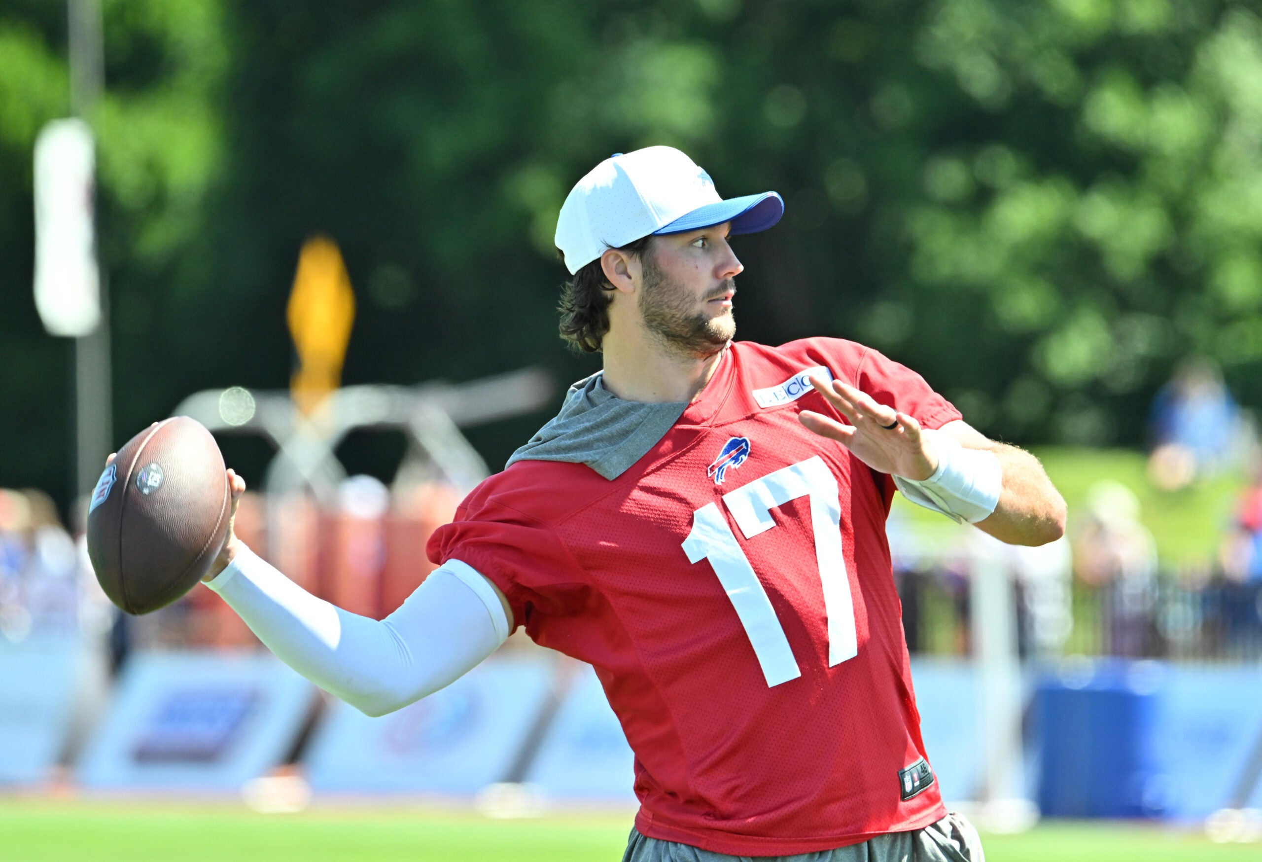 Jul 23, 2025; Rochester, NY, USA; Buffalo Bills quarterback Josh Allen (17) throws a pass during training camp at St. John Fisher University.