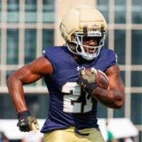 Notre Dame running back Kedren Young runs the ball during a football practice at Irish Athletic Center on Friday, Aug. 1, 2025, in South Bend.
