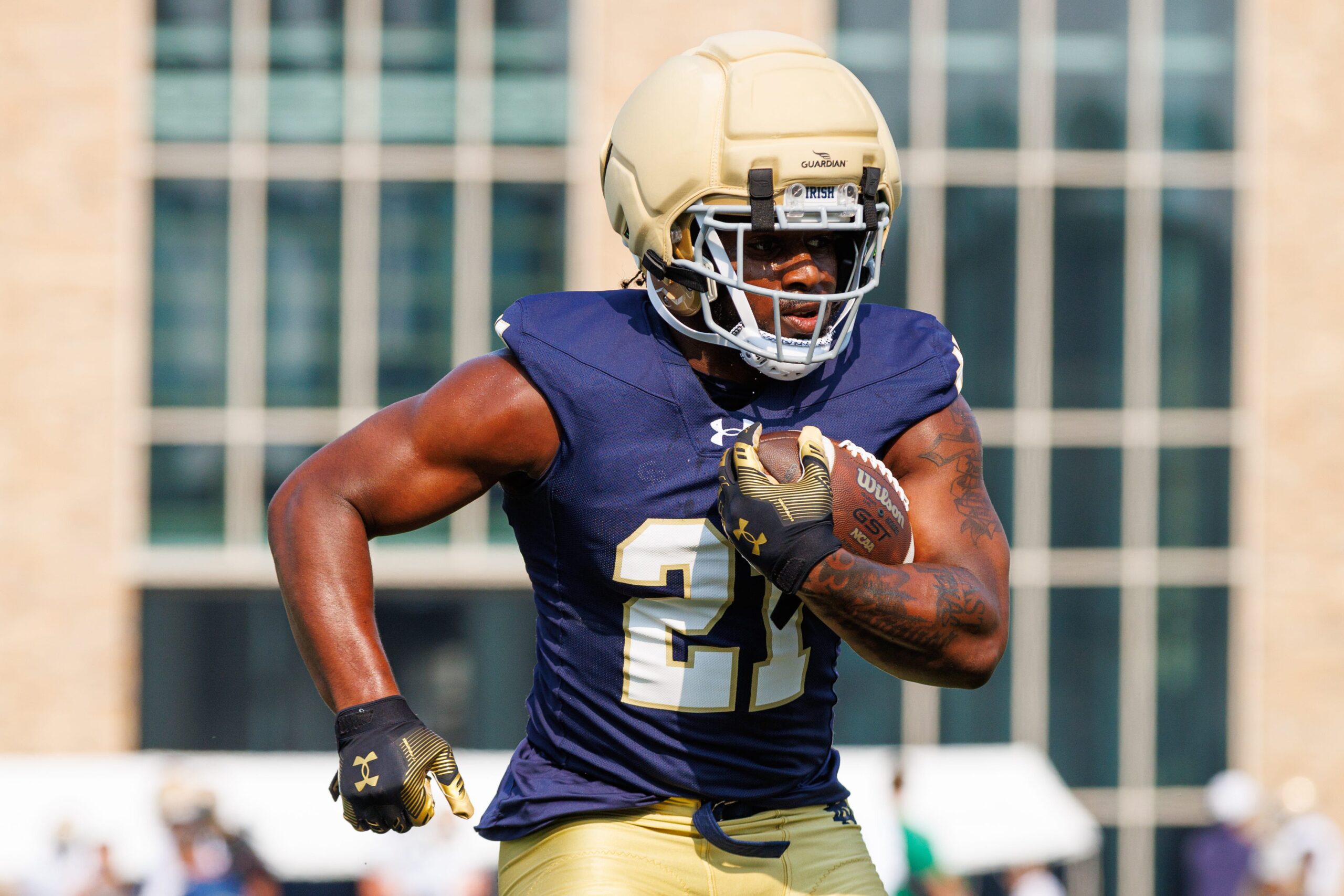 Notre Dame running back Kedren Young runs the ball during a football practice at Irish Athletic Center on Friday, Aug. 1, 2025, in South Bend.