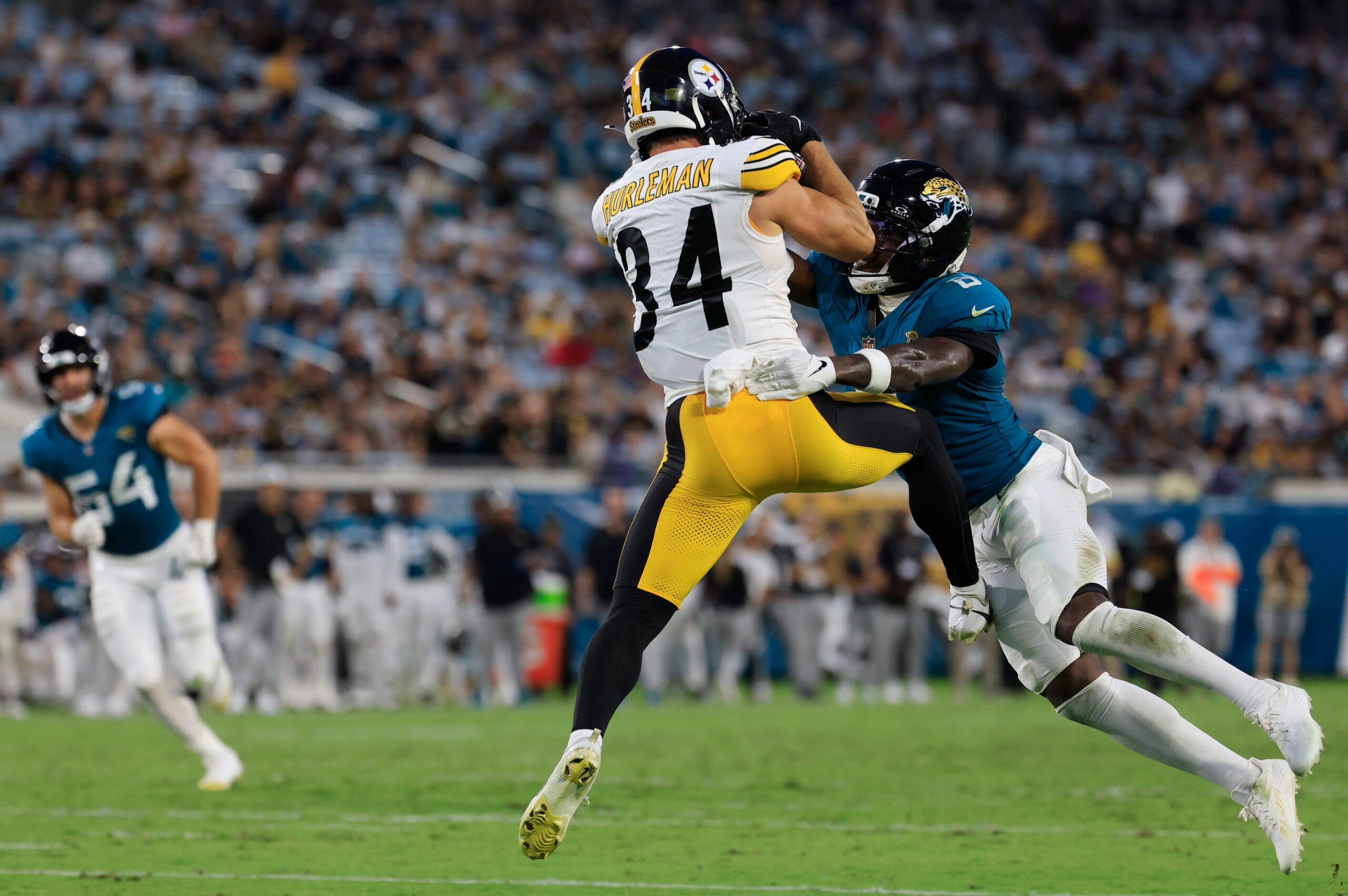 Jacksonville Jaguars safety Darnell Savage (6) tackles Pittsburgh Steelers running back Max Hurleman (34)during the second quarter of an NFL preseason matchup at EverBank Stadium, Saturday, Aug. 9, 2025 in Jacksonville, Fla.