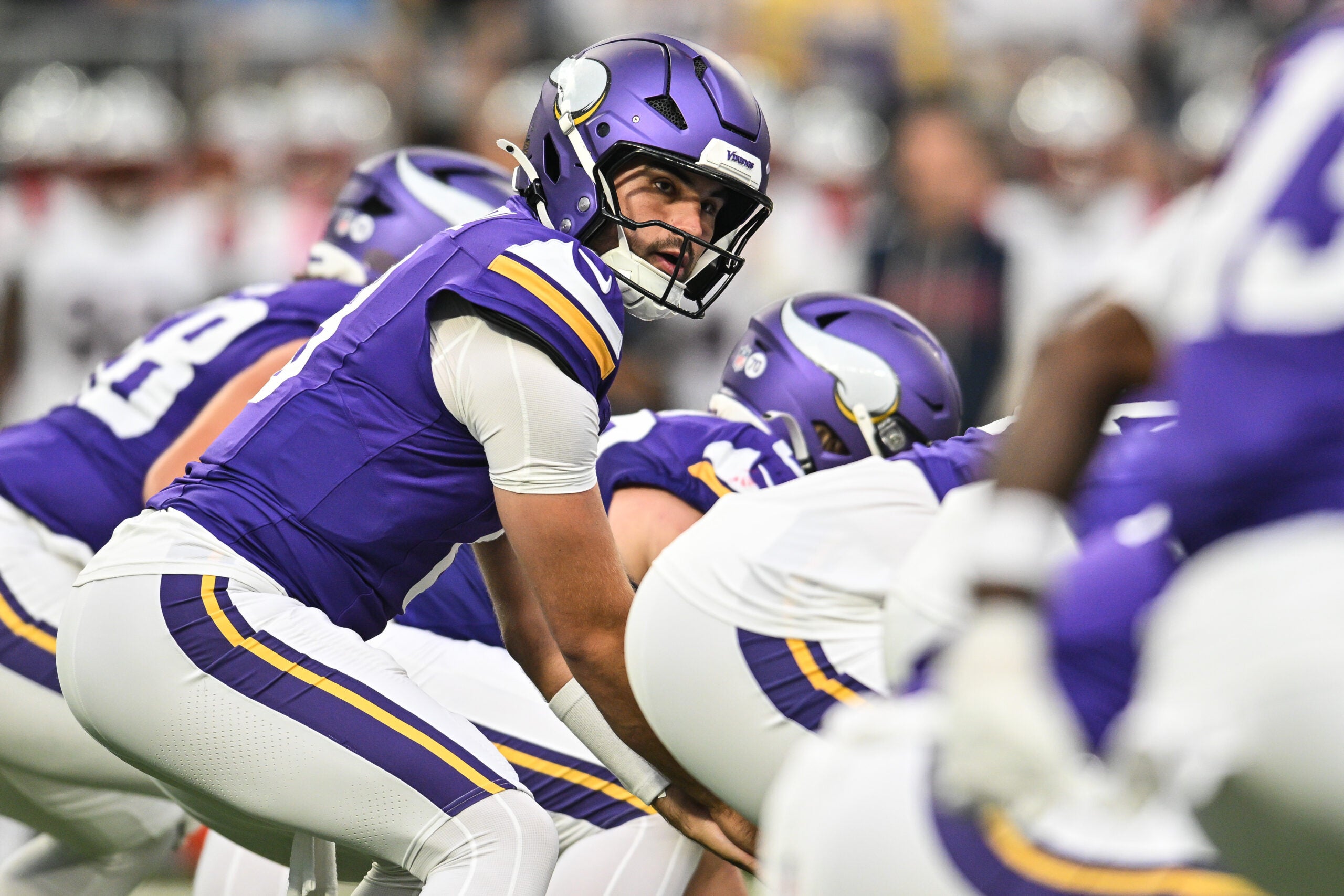 Aug 16, 2025; Minneapolis, Minnesota, USA; Minnesota Vikings quarterback Sam Howell (8) looks over the offense against the New England Patriots during the first quarter at U.S. Bank Stadium.