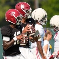 Aug. 19, 2025, Tuscaloosa, AL; Quarterbacks Keelon Russell and Austin Mack throw during practice for the Alabama Crimson Tide.