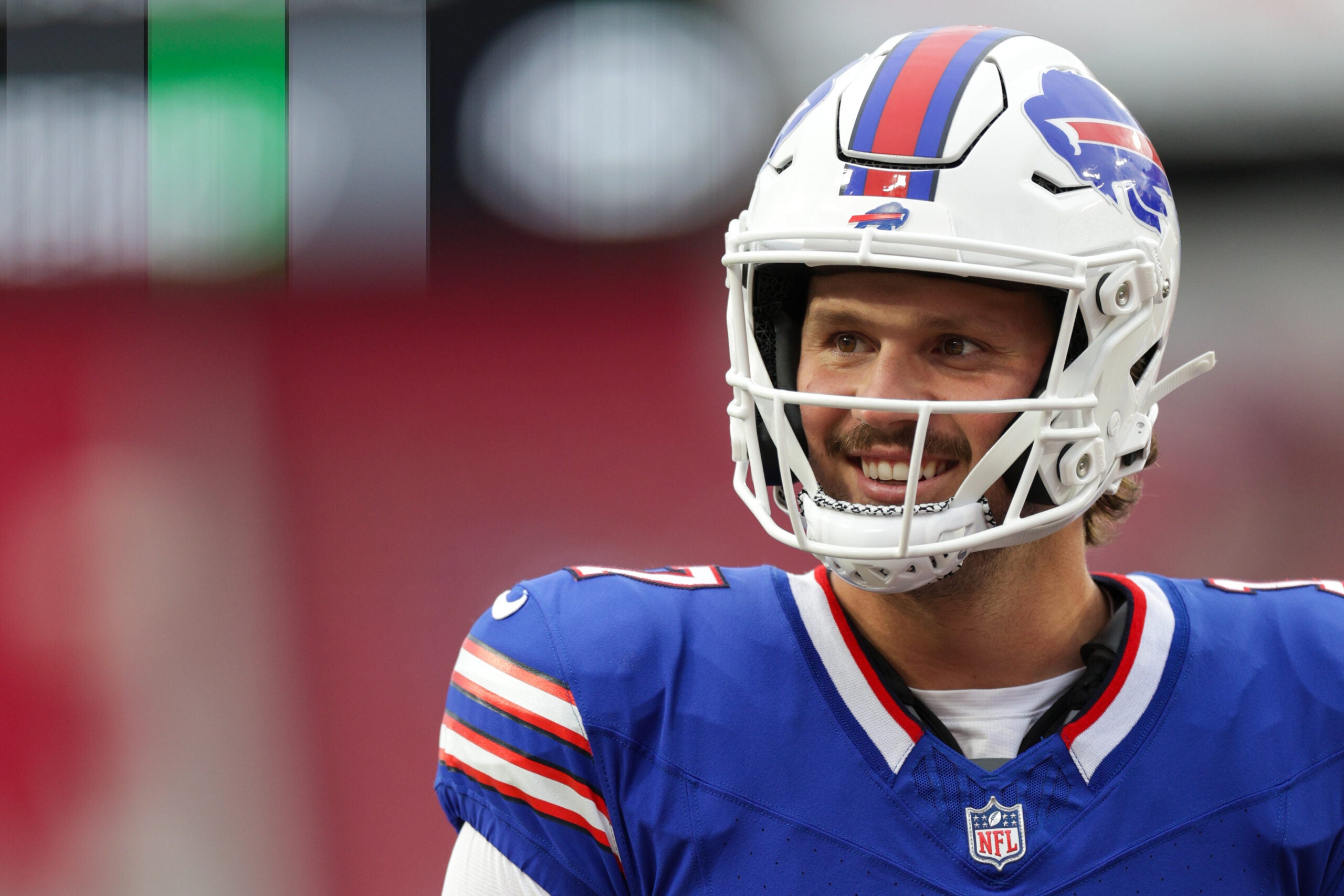Aug 23, 2025; Tampa, Florida, USA; Buffalo Bills quarterback Josh Allen (17) warms up before a game against the Tampa Bay Buccaneers at Raymond James Stadium.