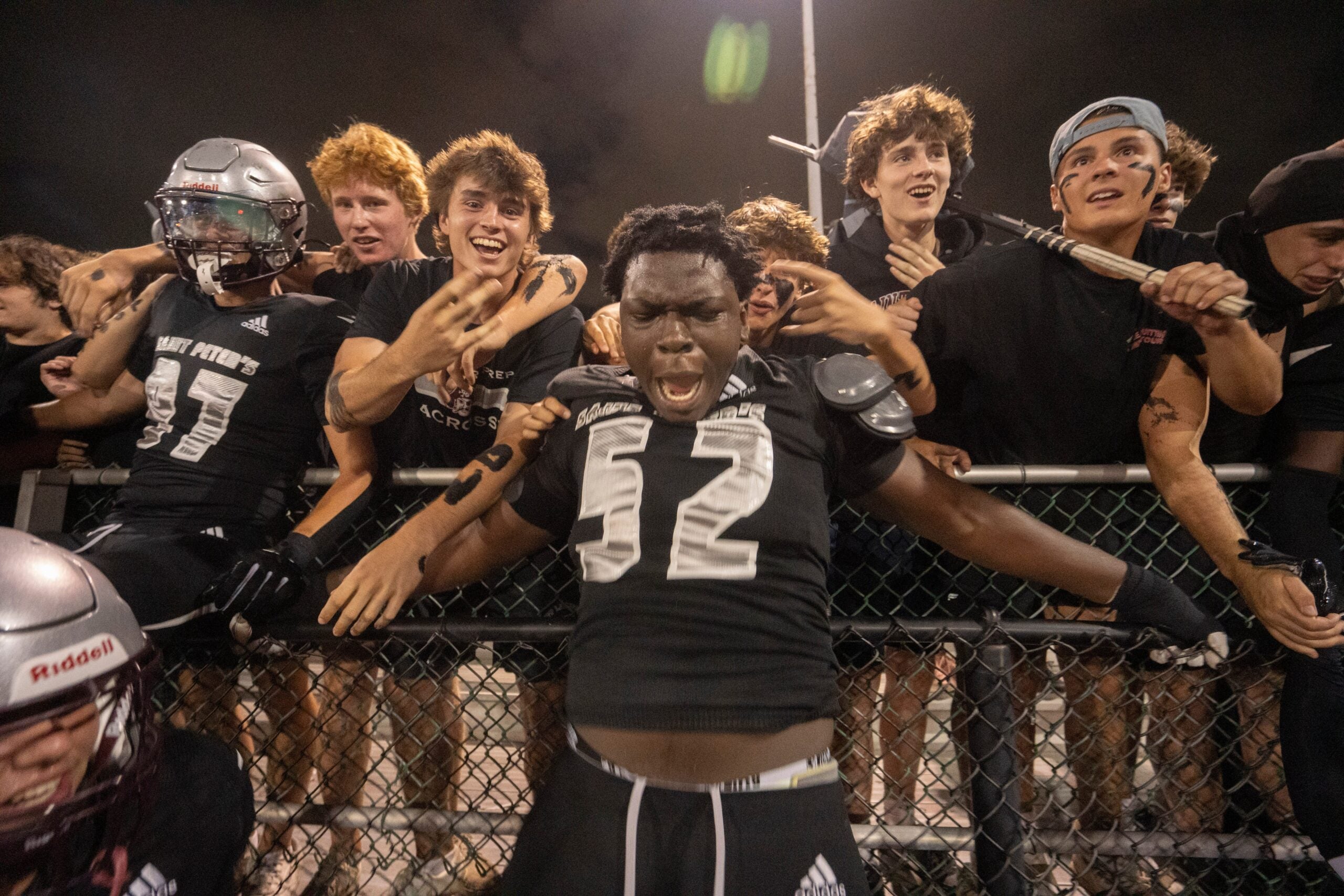 St. Peter Prep's Olubobola Oluwasemilore (52) celebrate with fans during a high school football game between St. Peter’s Prep and Paramus Catholic in Jersey City on Friday, Aug. 29, 2025.