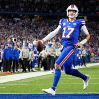 Sep 7, 2025; Orchard Park, New York, USA; Buffalo Bills quarterback Josh Allen (17) -rtb for a touchdown during the fourth quarter against the Baltimore Ravens at Highmark Stadium.