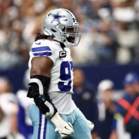 Sep 14, 2025; Arlington, Texas, USA; Dallas Cowboys defensive tackle Osa Odighizuwa (97) reacts after a play against the New York Giants during the second quarter at AT&T Stadium.