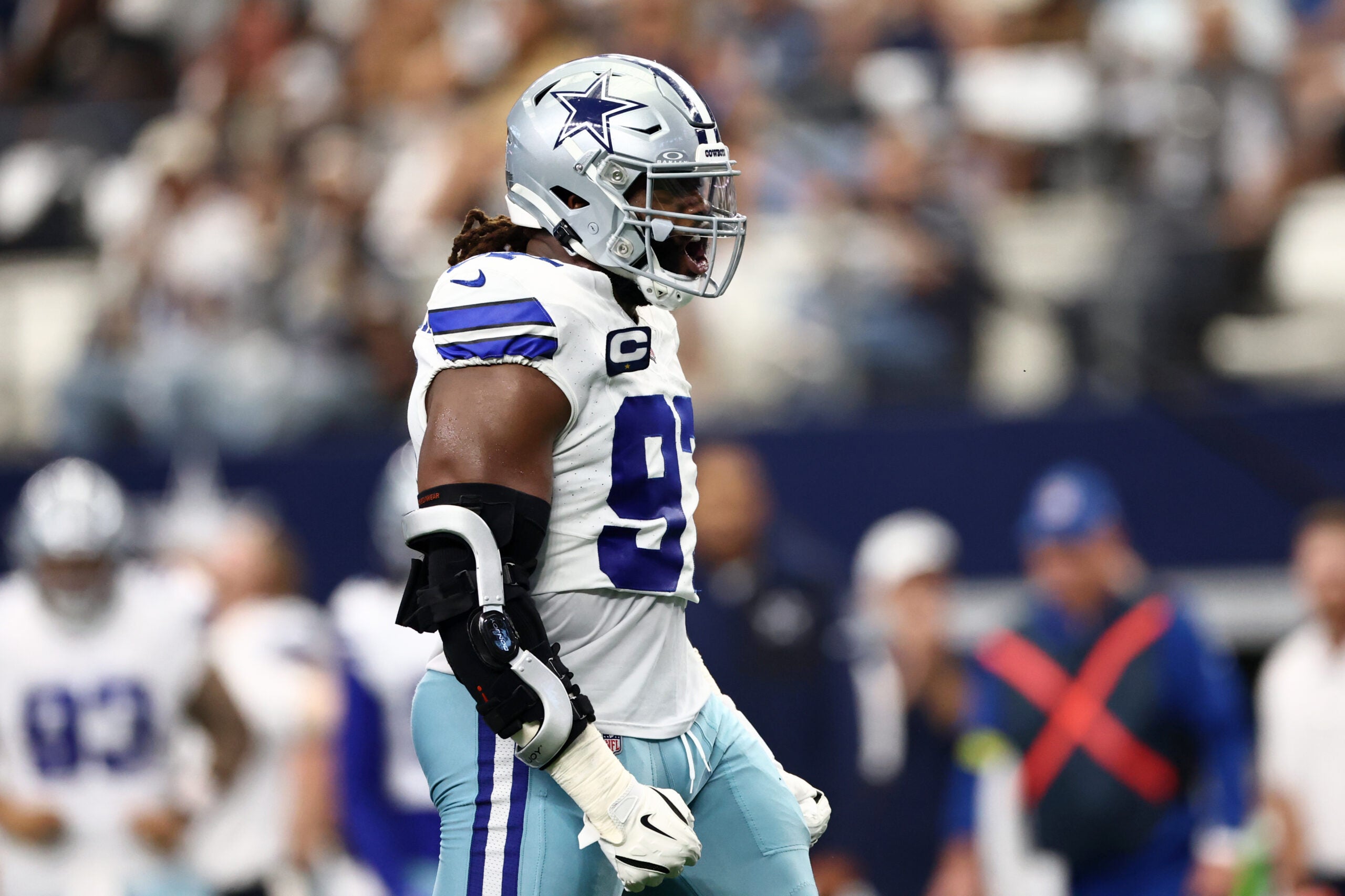 Sep 14, 2025; Arlington, Texas, USA; Dallas Cowboys defensive tackle Osa Odighizuwa (97) reacts after a play against the New York Giants during the second quarter at AT&T Stadium.