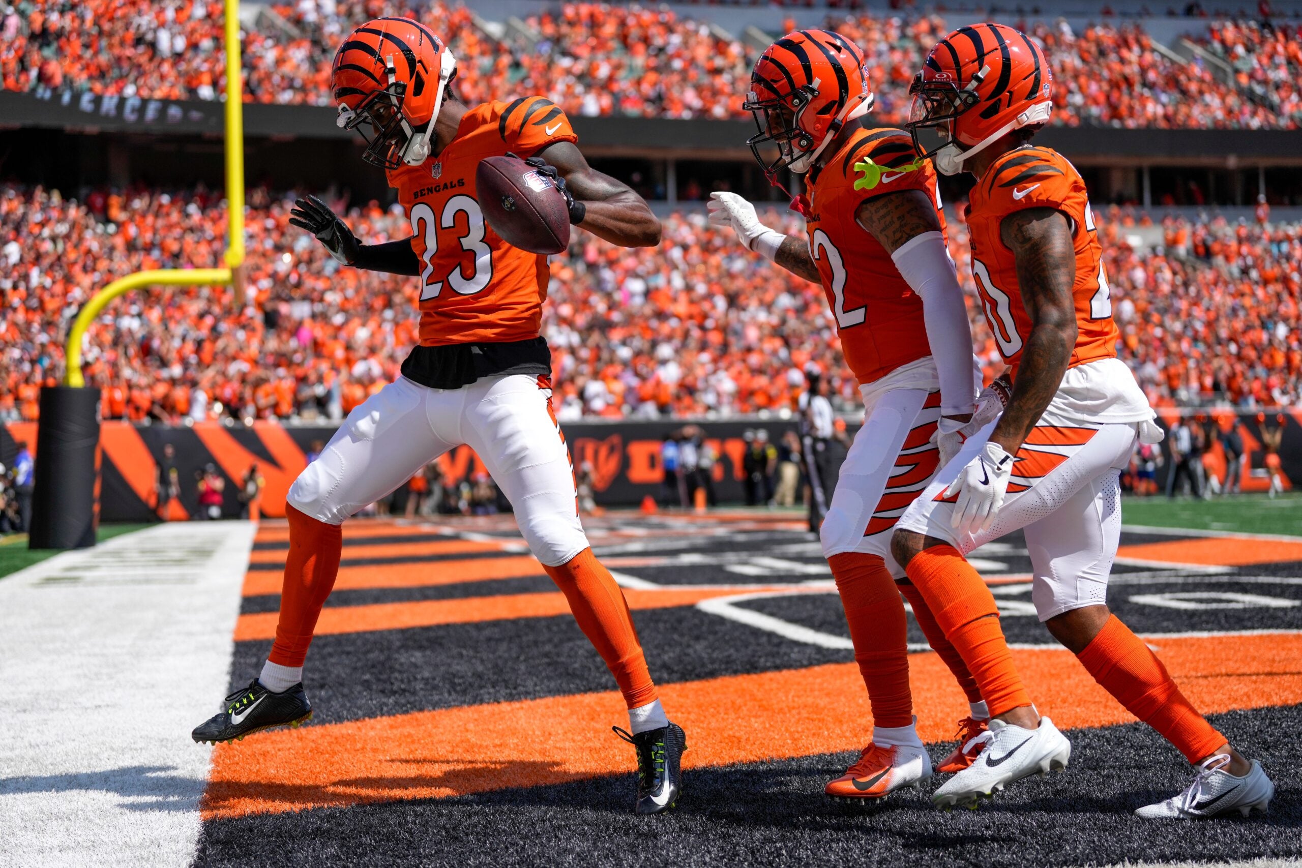 Cincinnati Bengals cornerback Dax Hill (23) celebrates an interception in the first quarter of the NFL Week 2 game between the Cincinnati Bengals and the Jacksonville Jaguars at Paycor Stadium in downtown Cincinnati on Sunday, Sept. 14, 2025. The Jaguars led 17-10 at halftime.
