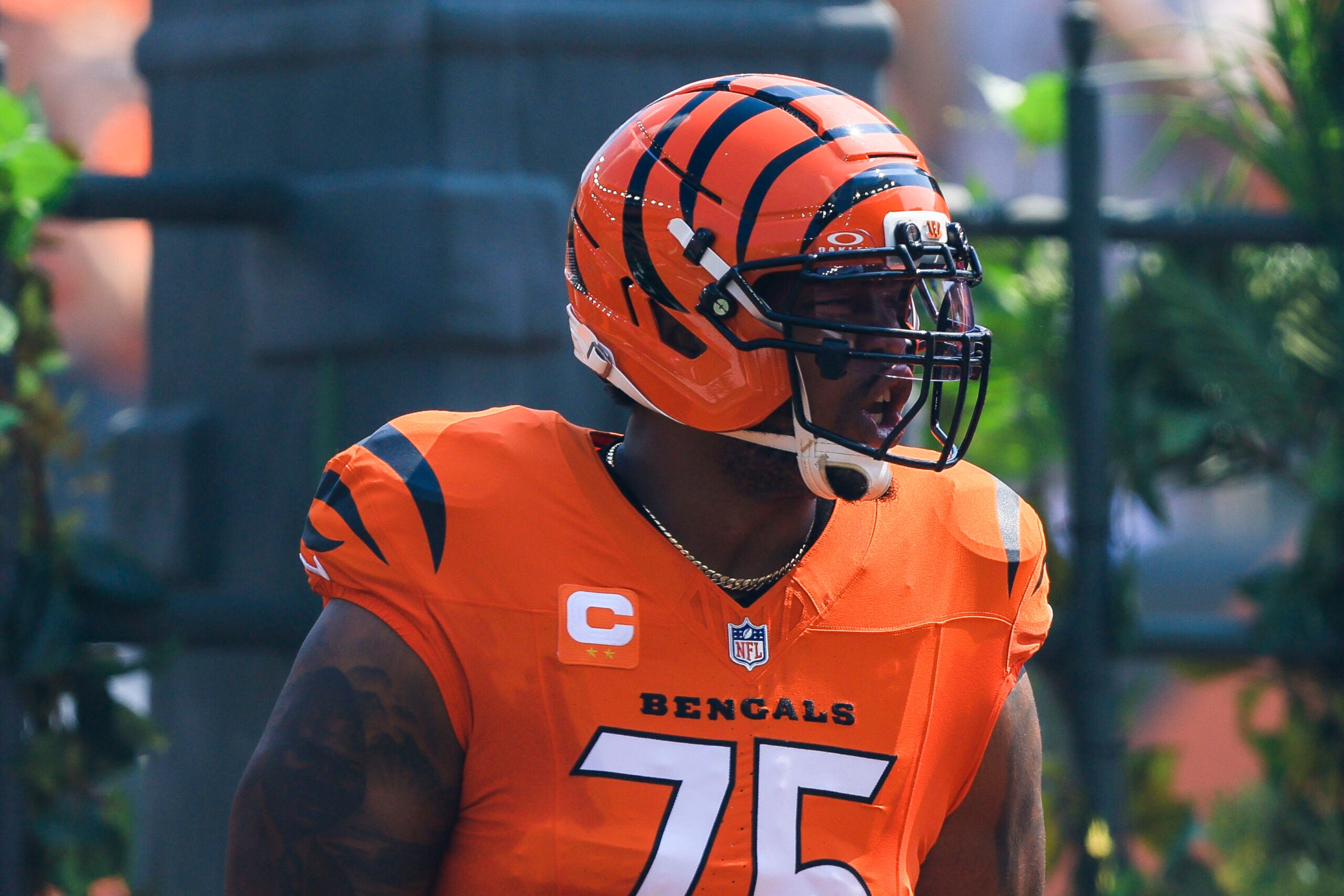 Sep 14, 2025; Cincinnati, Ohio, USA; Cincinnati Bengals offensive tackle Orlando Brown Jr. (75) runs onto the field before the game against the Jacksonville Jaguars at Paycor Stadium.
