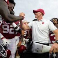 Oklahoma coach Brent Venables celebrates with Oklahoma Sooners wide receiver Jer'Michael Carter (84) after a college football game between the University of Oklahoma Sooners (OU) and the Auburn Tigers at Gaylord Family Ð Oklahoma Memorial Stadium in Norman, Okla., Saturday,Sept. 20, 2025. Oklahoma won 24-17.