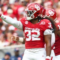 Sep 20, 2025; Norman, Oklahoma, USA; Oklahoma Sooners defensive lineman R Mason Thomas (32) reacts after recording a sack during the third quarter against the Auburn Tigers at Gaylord Family-Oklahoma Memorial Stadium. Mandatory Credit: Kevin Jairaj-Imagn Images