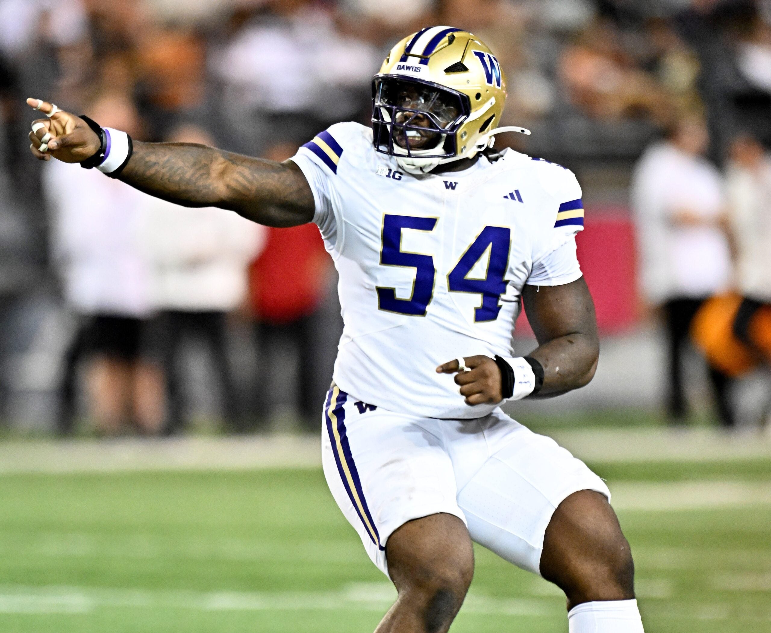 Sep 20, 2025; Pullman, Washington, USA; Washington Huskies defensive lineman Anterio Thompson (54) celebrates a Washington State Cougars turnover in the second half of Apple Cup at Gesa Field at Martin Stadium. Washington Huskies won 59-24.