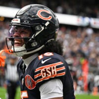 Sep 21, 2025; Chicago, Illinois, USA; Chicago Bears Rome Odunze yells after scoring a touchdown against the Dallas Cowboys during the first half at Soldier Field.