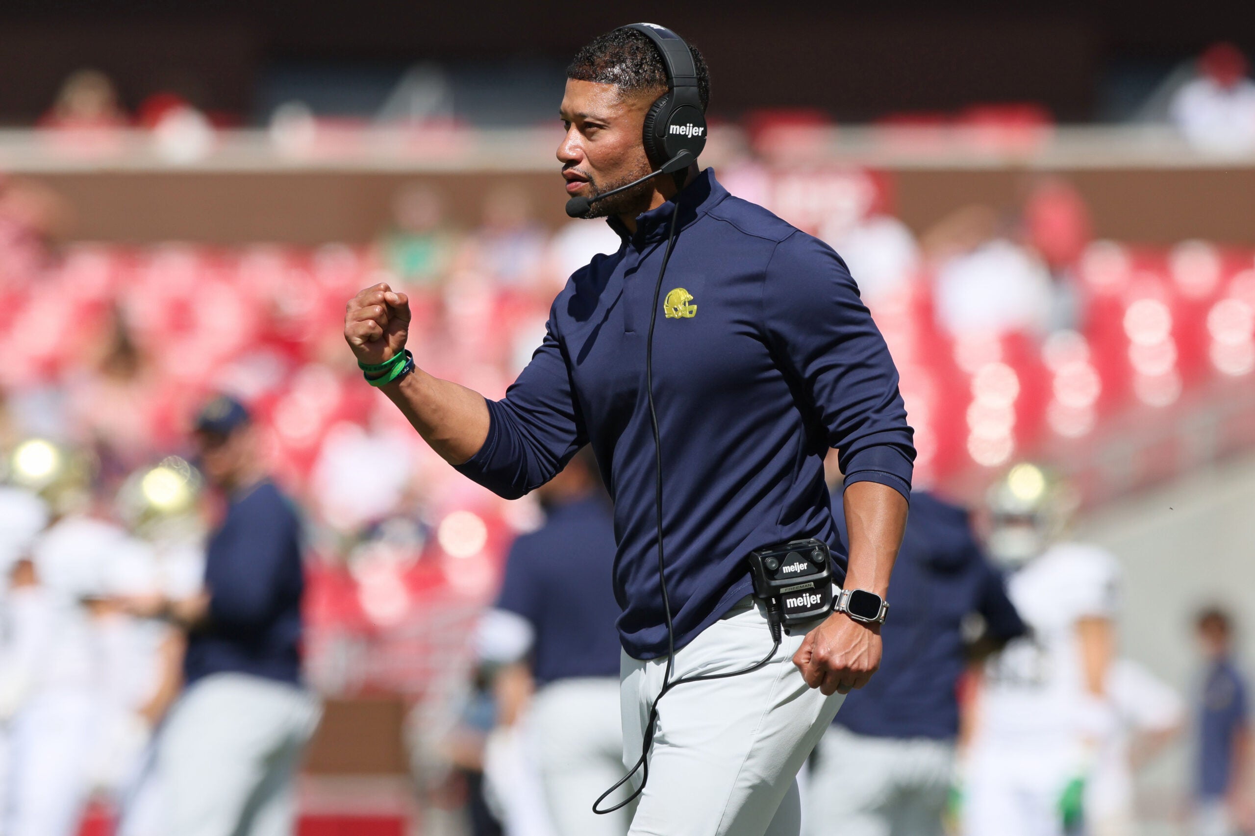 Sep 27, 2025; Fayetteville, Arkansas, USA; Notre Dame Fighting Irish head coach Marcus Freeman celebrates after a score during the third quarter against the Arkansas Razorbacks at Donald W. Reynolds Razorback Stadium. Notre Dame won 56-13. Mandatory Credit: Nelson Chenault-Imagn Images