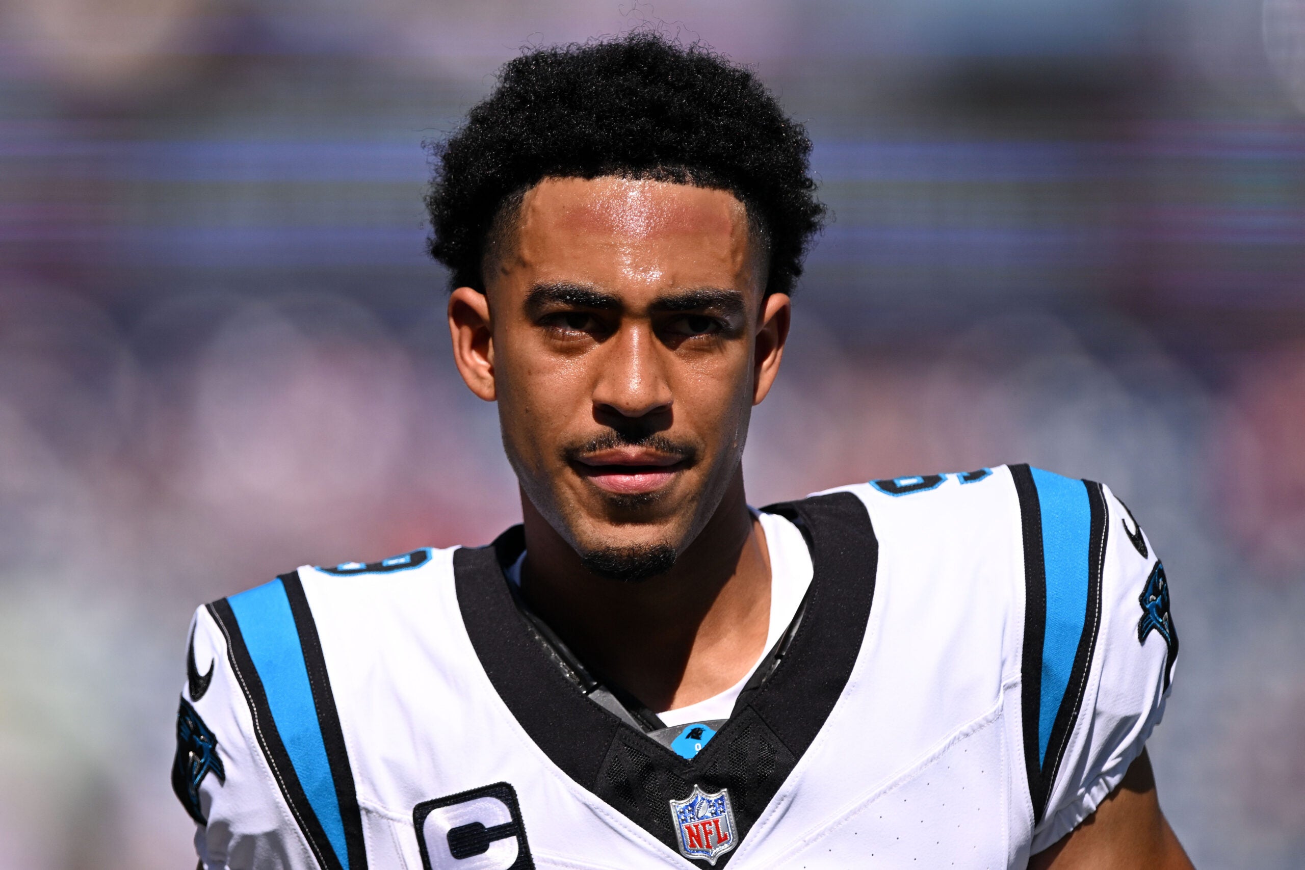 Sep 28, 2025; Foxborough, Massachusetts, USA; Carolina Panthers quarterback Bryce Young (9) runs off of the field during warmups before a game against the New England Patriots at Gillette Stadium.