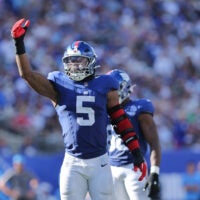 Sep 28, 2025; East Rutherford, New Jersey, USA; New York Giants linebacker Kayvon Thibodeaux (5)reacts during the fourth quarter against the Los Angeles Chargers at MetLife Stadium.
