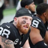 Sep 28, 2025; Paradise, Nevada, USA; Las Vegas Raiders defensive end Maxx Crosby (98) looks on from the sideline during the first quarter against the Chicago Bears at Allegiant Stadium.