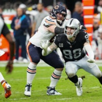 Sep 28, 2025; Paradise, Nevada, USA; Chicago Bears guard Joe Thuney (62) attempts to stop Las Vegas Raiders defensive end Maxx Crosby (98) during the second half at Allegiant Stadium.