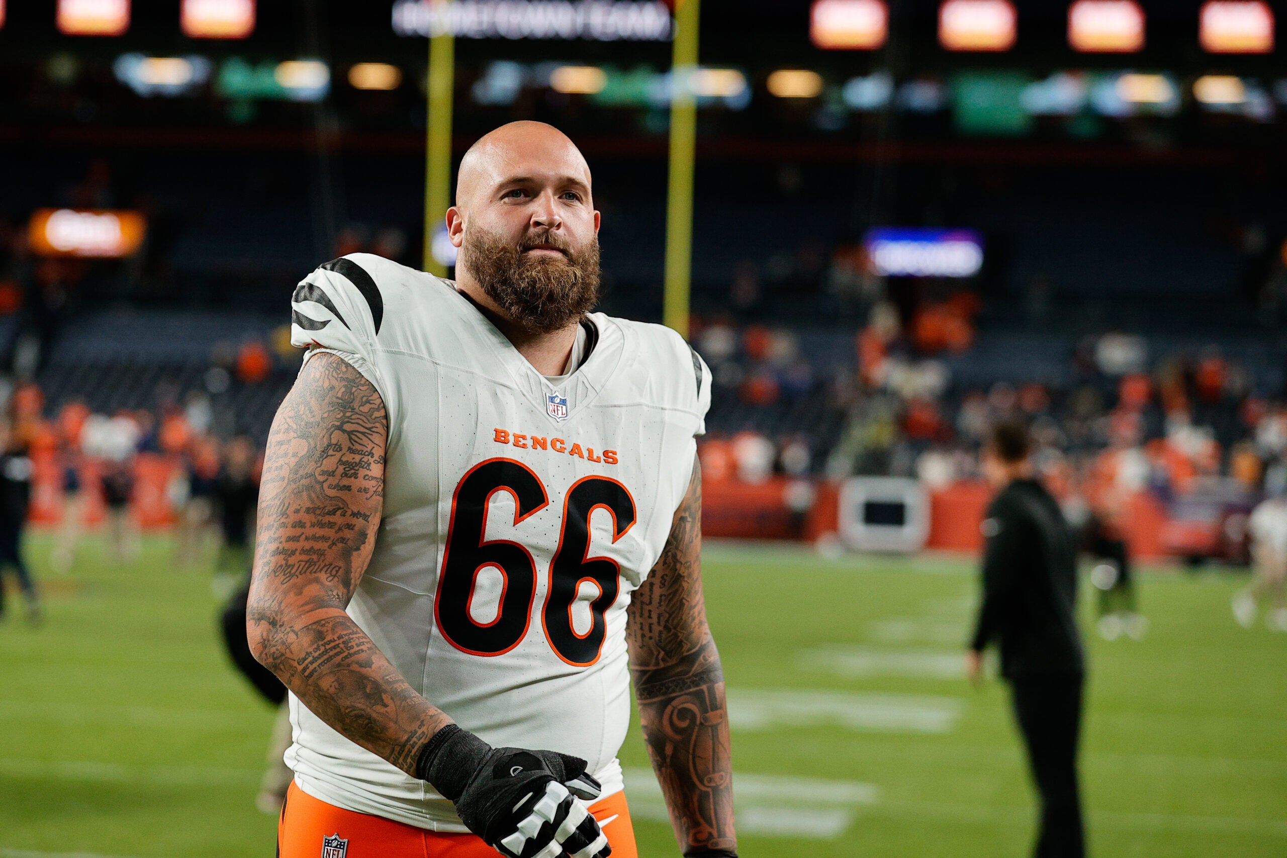 Sep 29, 2025; Denver, Colorado, USA; Cincinnati Bengals guard Dalton Risner (66) looks on after the game against the Denver Broncos at Empower Field at Mile High.