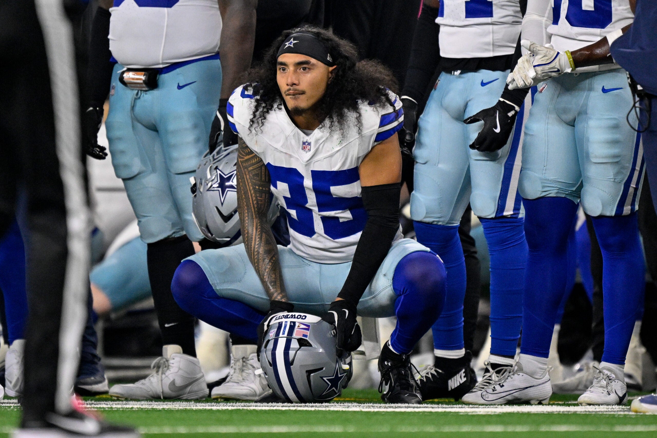 Sep 28, 2025; Arlington, Texas, USA; Dallas Cowboys linebacker Marist Liufau (35) looks on from the sidelines during the game between the Dallas Cowboys and the Green Bay Packers at AT&T Stadium.