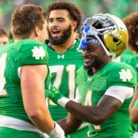 Oct 4, 2025; South Bend, Indiana, USA; Notre Dame Fighting Irish running back Jeremiyah Love (4) and Notre Dame Fighting Irish offensive lineman Anthonie Knapp (54) after beating the Boise State Broncos at Notre Dame Stadium. Mandatory Credit: Michael Caterina-Imagn Images