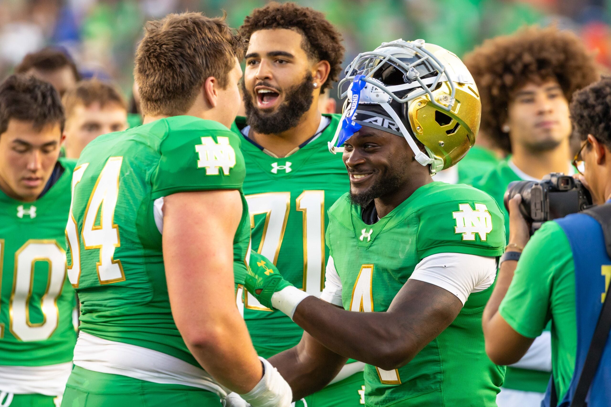 Oct 4, 2025; South Bend, Indiana, USA; Notre Dame Fighting Irish running back Jeremiyah Love (4) and Notre Dame Fighting Irish offensive lineman Anthonie Knapp (54) after beating the Boise State Broncos at Notre Dame Stadium. Mandatory Credit: Michael Caterina-Imagn Images